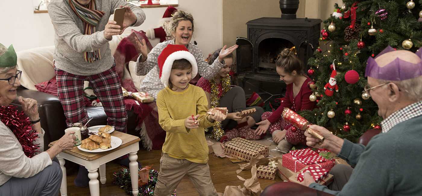 Family pulling Christmas cracker